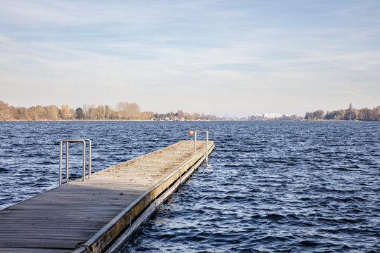 Germany, Lower Saxony, Wilhelmshaven, Empty jetty on shore of Lake Bant