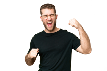 Young handsome blonde man over isolated chroma key background celebrating a victory