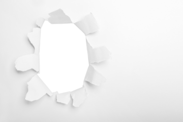 a hole in turquoise paper