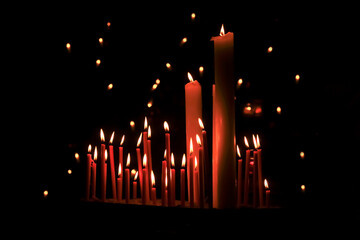 Studio shoot of red burning candles