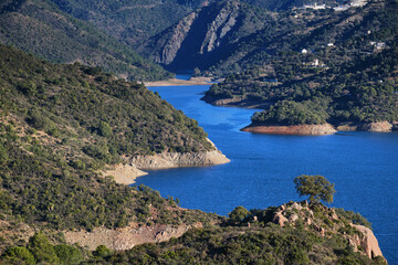 Fototapeta na wymiar Views of the Istan reservoir to Marbella from the top of the Sierra Blanca shell