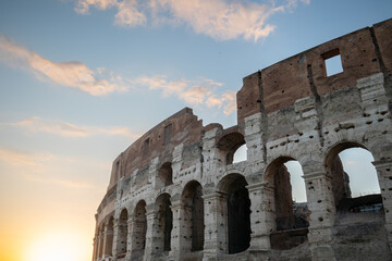 Fototapeta premium Colosseum at sunset in Rome, Italy
