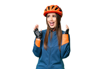 Young cyclist woman over isolated chroma key background with surprise facial expression - obrazy, fototapety, plakaty