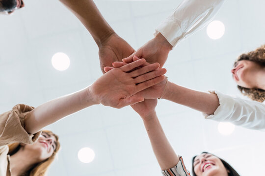 United business team stacking hands