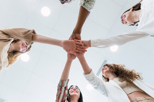 United business team stacking hands