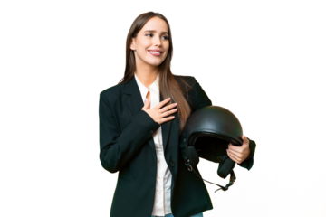 Young Asian woman with a motorcycle helmet over isolated chroma key background looking up while smiling