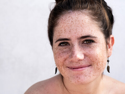 Pretty Girl With Freckles Smiling