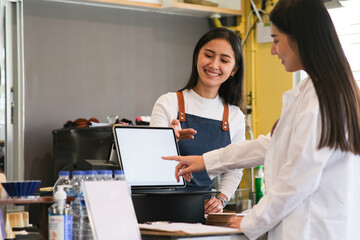Customer self service order drink menu with tablet screen.