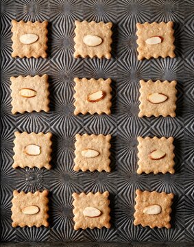 Overhead Shot Of Almond Cookies On Vintage Baking Tray