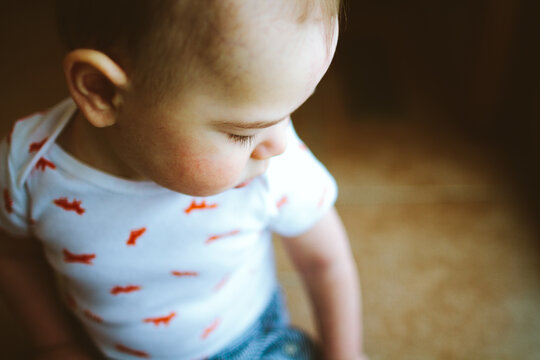 Portrait Of A Baby Boy Looking Away