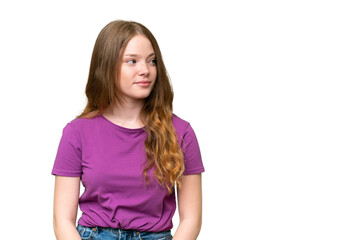 Young pretty woman over isolated background looking to the side