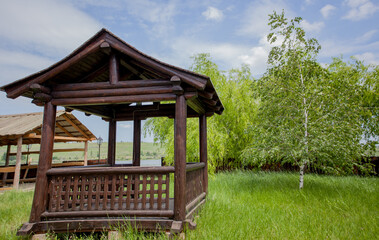 Wooden gazebo in the forest