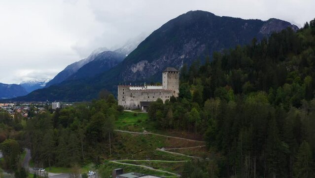 Aerial View Of Castle Bruck Beside River Isel In Austria. Slow Ascending Shot