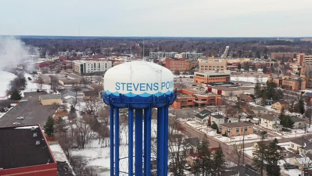 Aerial, Stevens Point water tower in Wisconsin during winter season