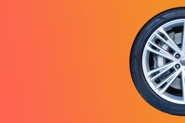 Car winter tire on colored