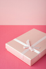 Gift box with pink ribbon