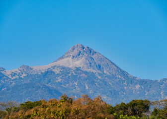Fototapeta premium Nevado de Colima and Colima volcano together in a clear sky