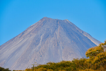 Nevado de Colima and Colima volcano together in a clear sky