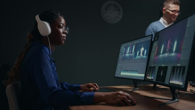 Black Woman Working As Videographer Editing Video With Musical Footage, Filmmaker Doing Retouch Work