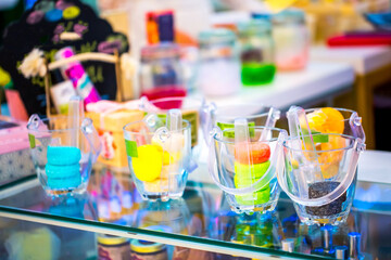 Candy bar, close-up of various desserts in cups. Multi-colored sweets on the buffet table.