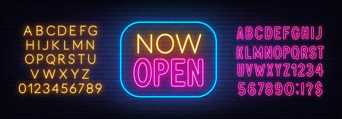 Now Open neon sign in frame on brick wall background. © TanyaFox