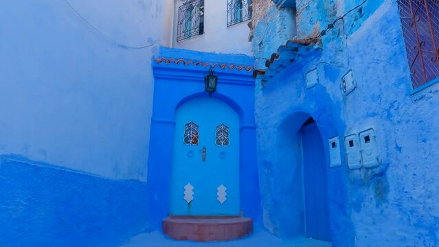 Blue painted buildings and doors of famous Moroccan city Chefchaouen (Blue City)