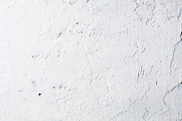 background of a white uneven concrete wall with white plaster, horizontal