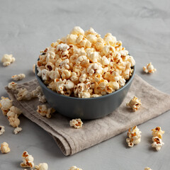 Homemade Kettle Corn Popcorn with Salt in a Bowl, side view.