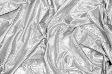 Silver gray silk fabric textile texture background. 