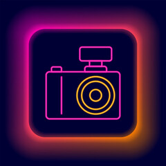 Glowing neon line Photo camera icon isolated on black background. Foto camera. Digital photography. Colorful outline concept. Vector