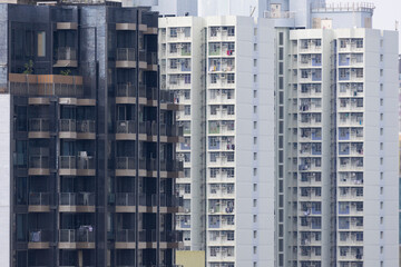 Naklejka premium 2022 Oct 14,Hong Kong.Dense and highrise residential apartment blocks in Hong Kong