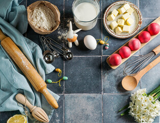 Easter culinary background. food ingredients composition on the kitchen table and copy space for a text menu or recipe