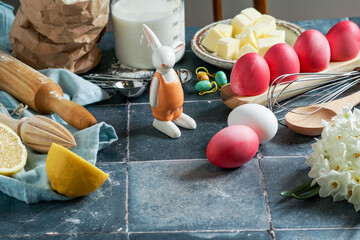 Easter culinary background. food ingredients composition on the kitchen table and copy space for a...
