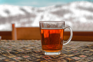 Hot boiled brandy on a table close with blurred background - 568738636