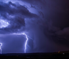 Obraz na płótnie Canvas Electric storm and lightning on landscape