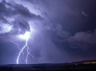 Electric storm and lightning on landscape