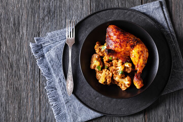 baked chicken leg with spicy roast cauliflower