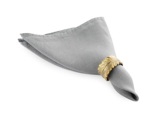 Napkin with decorative ring for table setting isolated on white