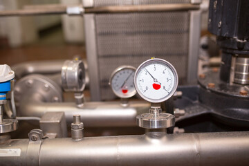 Industrial interior chiller and boiler HVAC heating ventilation air conditioning system and pipping line of industrial construction at boiler pump room system in the factory. factory compressor