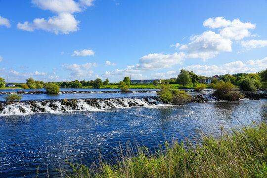 Ruhrwehr with fish ladder near Hattingen. View of the Ruhr and the surrounding countryside. Nature by the river in the Ruhr area.
