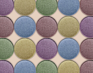 Collage of beautiful different eye shadow refill pans on beige background