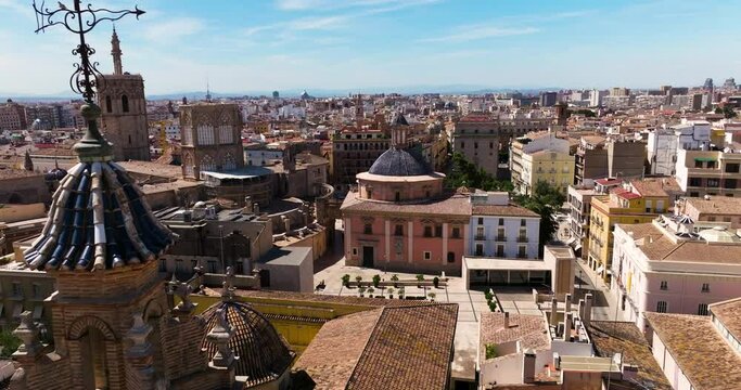 San Esteban Bell Tower And Basilica de la Virgen de los Desamparados At Plaza D&eacute;cimo Junio Bruto In Valencia, Spain. Aerial Drone Shot