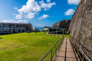 A view between battlements in of the Castle of San Cristobal, San Juan, Puerto Rico on a bright sunny day