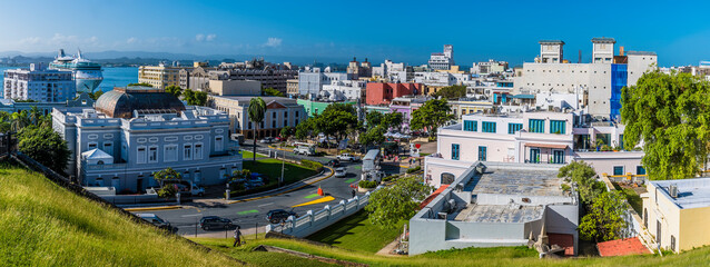 Fototapeta na wymiar A panorama view south west from the battlements of the Castle of San Cristobal, San Juan, Puerto Rico on a bright sunny day