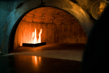 Inside the oven for Baking Neapolitan pizza in a gas-fired classic Italian pizza oven with high...