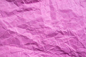 Fototapeta premium Crumpled pink paper texture background