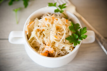 sauerkraut with carrots and spices in a bowl