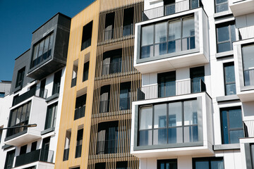 Residential Apartment with wood panels and blue clear sky