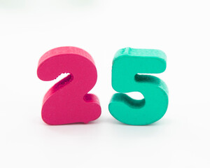 25 colorful wooden numbers decorative on the white