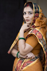 Indian rural woman in traditional saree.